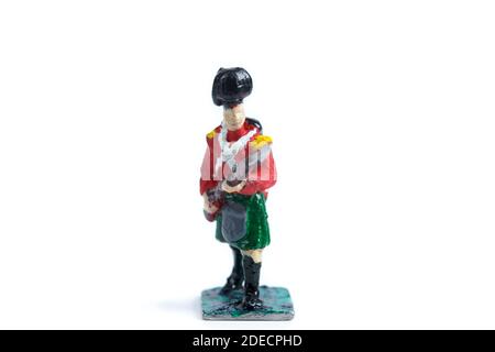 Image of vintage tin soldier's figurine on the white background Stock Photo