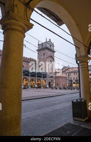 Mantua, Lombardy, Italy, December 2015: The Clock Tower and The church of the Rotonda San Lorenzo located in Piazza delle Erbe, during the Christmas Time. Stock Photo