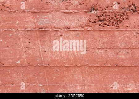 Red grunge wall background. Apricot colored texture. Stock Photo
