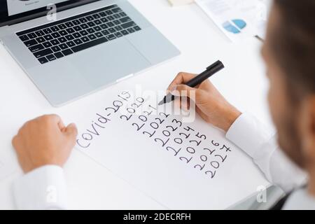 business man making notes on a piece of paper. Stock Photo
