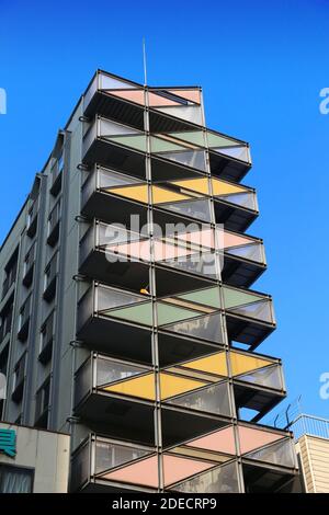 OSAKA, JAPAN - NOVEMBER 22, 2016: Generic apartment building in residential district of Osaka, Japan. Osaka belongs to 2nd largest metropolitan area o Stock Photo