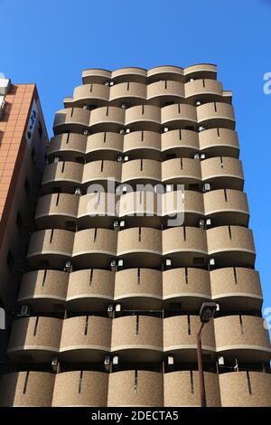 OSAKA, JAPAN - NOVEMBER 22, 2016: Generic apartment building in residential district of Osaka, Japan. Osaka belongs to 2nd largest metropolitan area o Stock Photo