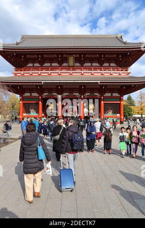 TOKYO, JAPAN - DECEMBER 2, 2016: People visit Sensoji Temple in Asakusa, Tokyo. Senso-ji Buddhist temple is dedicated to the bodhisattva Kannon. Stock Photo