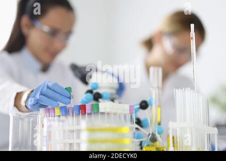 Two researchers are conducting experiments in laboratory. Stock Photo