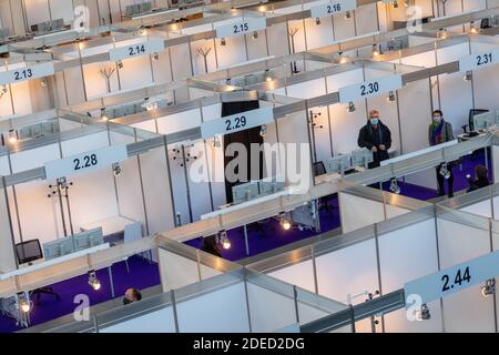 Munich, Germany. 30th Nov, 2020. Dieter Reiter (l), Lord Mayor of Munich and Beatrix Zurek (r), Health Officer of the City of Munich, visit the Contact Tracing Center that was set up at Messe Riem. Credit: Peter Kneffel/dpa/Alamy Live News Stock Photo