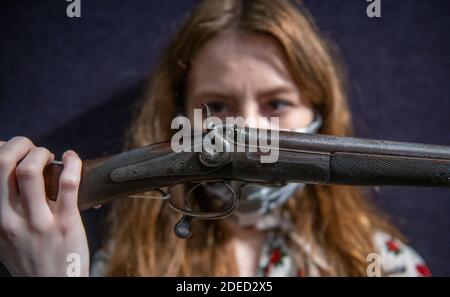 Knightsbridge, London, UK. 30th Nov, 2020. Preview of Bonhams' Antique Arms, Modern Sporting Guns & Exceptional Firearms sale in London. The sale will be held on 3 December. Image: Bonhams staff with a 28-bore single-barrelled lightweight child's hammer gun by J. Purdey, no. 9691, made for Prince Duleep Singh. Prince Duleep Singh was the last Maharaja of the Sikh Empire. He was brought to the UK when he was 15 and quickly became very close with Queen Victoria. Estimate: £35,000-55,000. Credit: Malcolm Park/Alamy Live News Stock Photo