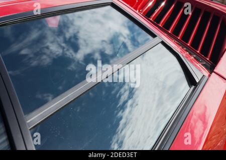 Close up detail of the strakes on the radiator intakes on a red ...