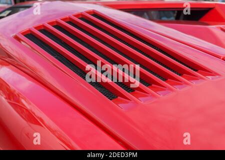 Close up detail of the strakes on the radiator intakes on a red ...