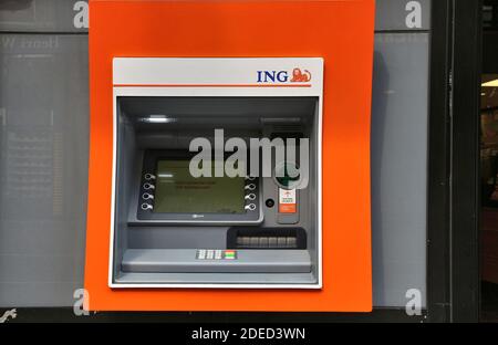 AMSTERDAM, NETHERLANDS - JULY 10, 2017: ING Bank ATM in Amsterdam, Netherlands. ING Group is one of largest banks in the world, with total assets of U Stock Photo