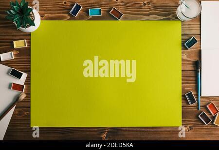 Flat lay Art designer color workspace . Creative top view with copy space yellow Stock Photo