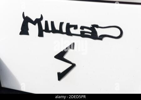 Close up of the name badge on the back of a white Lamborghini Miura P400 S outside in sunshine Stock Photo
