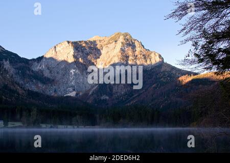 sunset in the mountains, vorderer langbathsee in upper austria Stock Photo