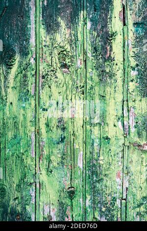 Turquoise cracked paint wooden wall background Stock Photo