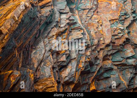 Rock layers , a colorful formation of rocks stacked over time. Interesting background a fascinating texture Stock Photo