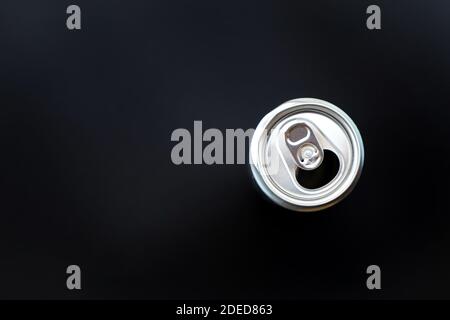 Flat lay of aluminum Can opened on black background with copy space Stock Photo