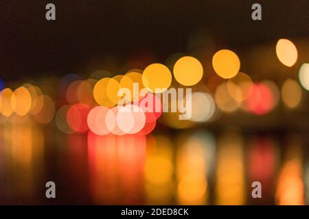 night bokeh with reflexion on water Stock Photo