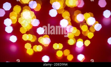 Background of defocused lights of different colors on red background. Abstract image. Valentine, love, passion and party concept Stock Photo