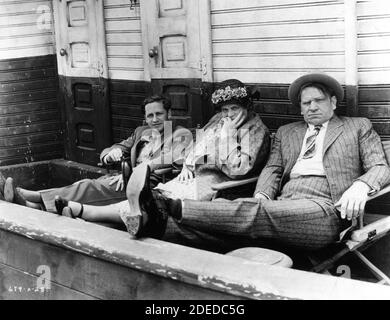 Director MERVYN LeROY MARIE DRESSLER and WALLACE BEERY on set candid during filming of TUGBOAT ANNIE 1933 director MERVYN LeROY Metro Goldwyn Mayer Stock Photo