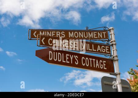 A direction sign in Arrowtown New Zealand giving dorections to tourist attractions Stock Photo