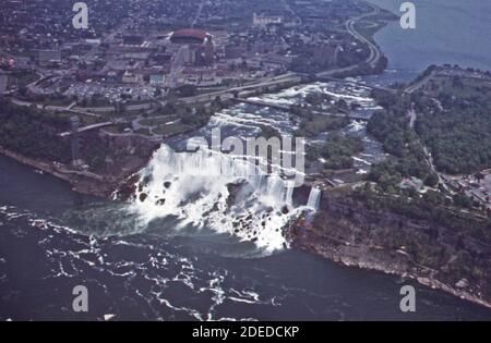 1970s Photo (1973) -  American Niagara Falls seen from the air. foam churning at the base is known to contain bacteria and other organisms Stock Photo