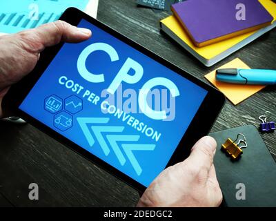 Cost Per Conversion CPC sign on the tablet. Stock Photo