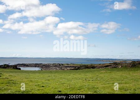 A view across fields and Wigtown Bay to Isle of Whithorn and Wigtown from near Kirkandrews  near Gatehouse of Fleet Dumfries and Galloway Scotland Stock Photo