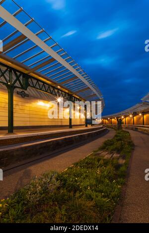 England, Kent, Folkestone, The Dis-used Folkestone Harbour Train Station at Night Stock Photo