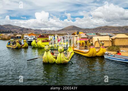 Tourist boats made of reed moored at Uros Islands, Lake Titicaca, Peru Stock Photo