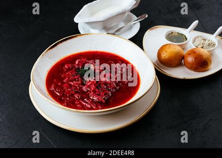 beetroot Russian soup on a textured black background Stock Photo