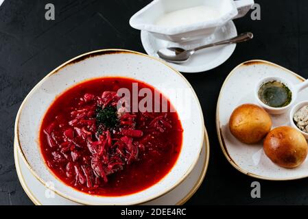 beetroot Russian soup on a textured black background Stock Photo