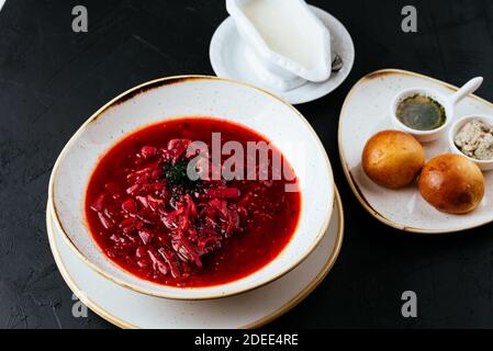 beetroot Russian soup on a textured black background Stock Photo