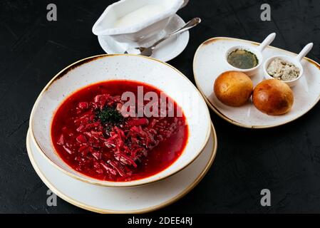 beetroot Russian soup on a textured black background Stock Photo