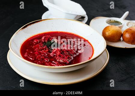 beetroot Russian soup on a textured black background Stock Photo