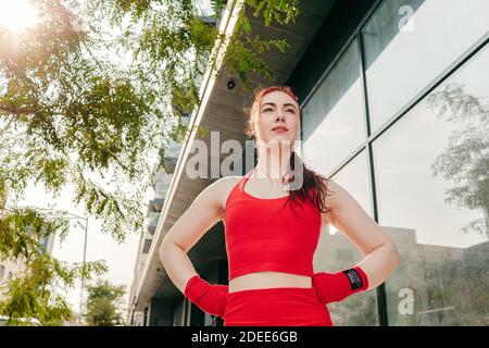 Portrait of a young woman boxer training outdoors in Brooklyn street. Stock Photo