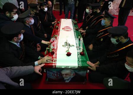 Tehran, Iran. 30th Nov, 2020. A handout photo made available by the Iranian defense ministry office shows soldiers praying next to the coffin of slain Iranian nuclear scientist Mohsen Fakhrizadeh during funeral procession inside the Iranian defense ministry in Tehran, Iran, Monday, November 30. 2020. Iranian officials have blamed Israel for the killing of Fakhrizadeh who led Tehran's disbanded military nuclear program. Photo by Iranian Defense Ministry/UPI Credit: UPI/Alamy Live News Stock Photo