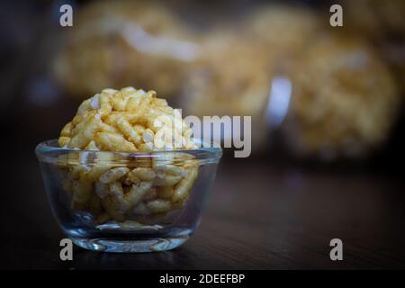 View of sweet puffed rice balls(also known as muri, porri) in a bowl. Muri ball is famous sweet of indian subcontinent made with muri and jaggery Stock Photo