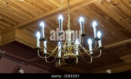 Decorated Chandelier Hangs in the Neo Gotic Style Old Castle Medieval Stock Photo