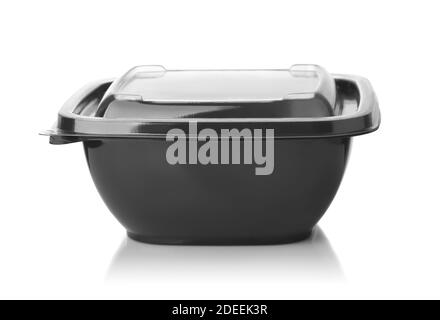 Front view of black plastic disposable take out food container with clear lid isolated on white Stock Photo