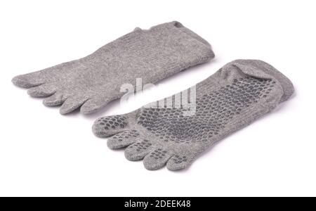 Gray non-slip yoga toe socks isolated on white Stock Photo