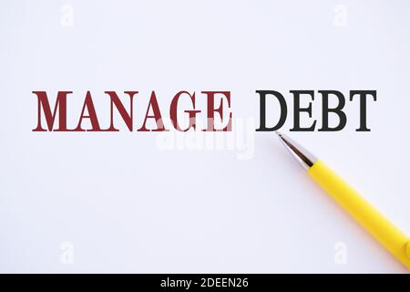 Writing note showing Manage Debt. Business photo showcasing unofficial agreement with unsecured creditors for repayment Stock Photo
