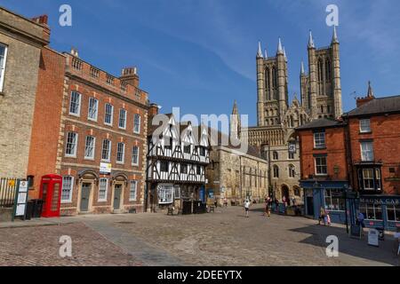 View across Castle Hill towards Exchequer Gate with Lincoln Cathedral behind, Lincoln, Lincolnshire, UK. Stock Photo