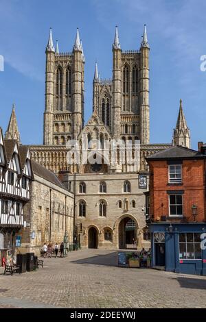 View across Castle Hill towards Exchequer Gate with Lincoln Cathedral behind, Lincoln, Lincolnshire, UK. Stock Photo