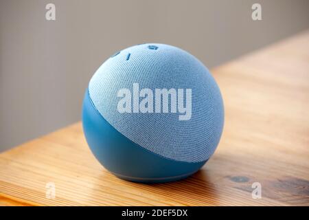 Amazon Echo Dot Smart Speaker with Alexa Voice Recognition & Control, 4th Generation, in twilight blue Stock Photo