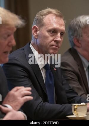 Acting United States Secretary of Defense Patrick M. Shanahan listens as US President Donald J. Trump makes remarks during an expanded bilateral meeting with Jens Stoltenberg, Secretary General of the North Atlantic Treaty Organization (NATO) in the Cabinet Room of the White House in Washington, DC on Tuesday, April 2, 2019. Photo by Ron Sachs/CNP/ABACAPRESS.COM Stock Photo
