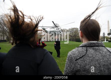 Guests watch US President Donald Trump onboard Marine One departing the White House in Washington, DC, on April 5, 2019.Photo by Olivier Douliery/ABACAPRESS.COM Stock Photo