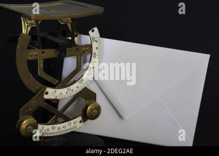 antique scales and envelope Stock Photo