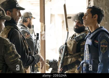 MOSUL, from left: Suhail Dabbach, Adam Bessa, 2019. ph: Jose Haro ...