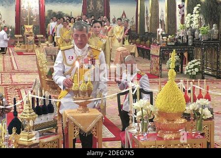 A handout photo made available by the Committee on Public Relations for the Coronation of King Rama X, shows Thai King Maha Vajiralongkorn Bodindradebayavarangkun (C) during the religious ceremony for the coronation inside the Royal palace in Bangkok, Thailand, 03 May 2019. The three-day ancient elaborate coronation ceremony of Thai King Rama X is scheduled for 04 to 06 May 2019. Editorial use only. Photo by Committee On Public Relations Fo Handout/ABACAPRESS.COM Stock Photo