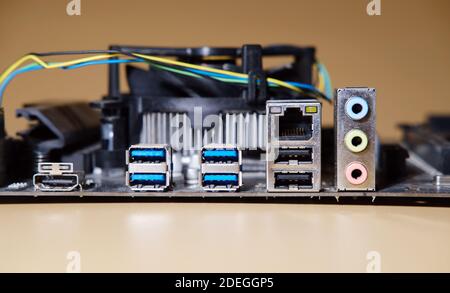 used modern motherboard back side with audio, usb, hdmi Stock Photo