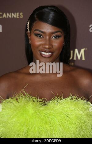 Aya Nakamura posing at the Plage Magnum during the 72nd Cannes Film